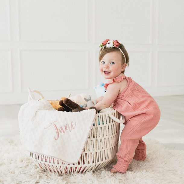 a baby in a basket. Portrait Photography Portrait Photographers by Bushel + Peck Photo
