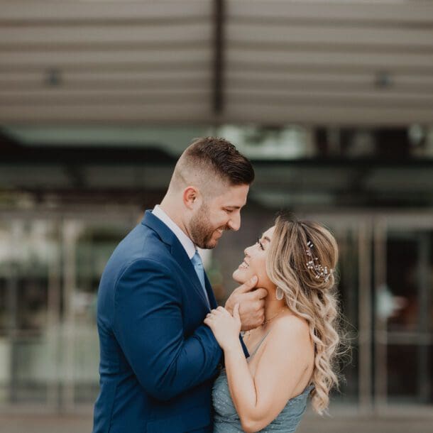 a man and woman holding each other's hands. Portrait -Photography, Portrait -Photographers