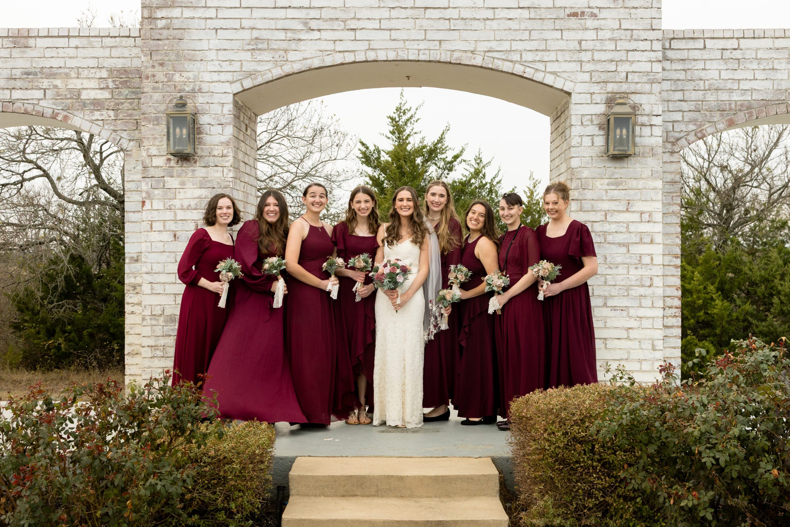 Burgundy and champagne fall wedding colors at The Grand Ivory in Leonard Texas photographed by Bushel + Peck Photo
