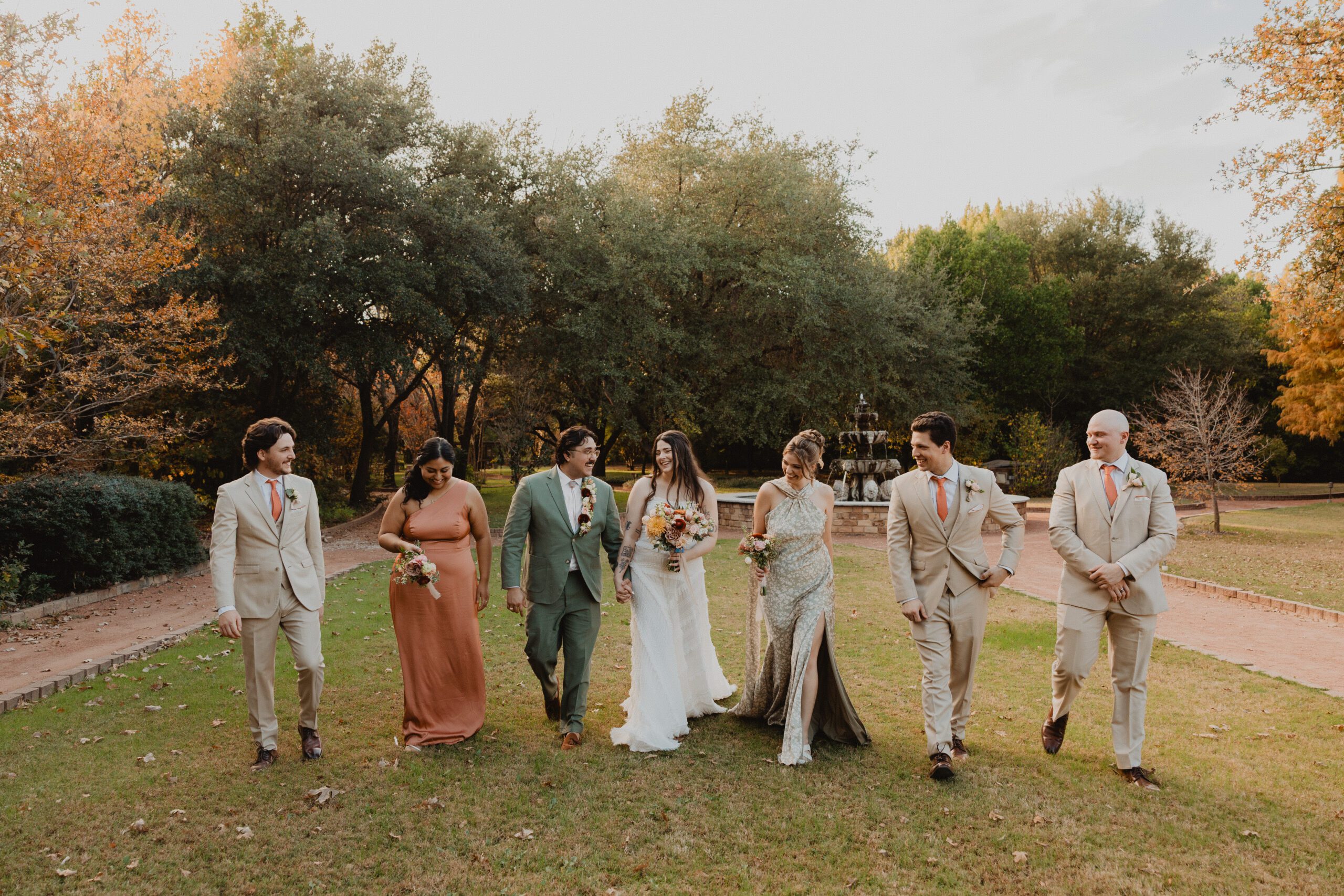 Terracotta and sage fall wedding party at Clark Gardens in Weatherford Texas photographed by Bushel + Peck Photo