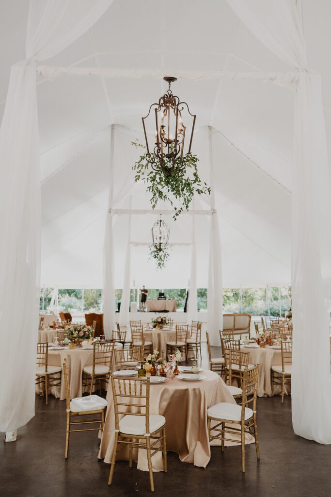 Blush, terracotta and antique gold tented fall wedding reception at Clark Gardens in Weatherford Texas photographed by Bushel + Peck Photo
