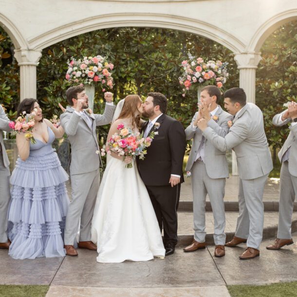 Wedding party celebrating after the ceremony at Knotting Hill Place wedding venue in Frisco near Dallas photographed by Bushel + Peck Photo