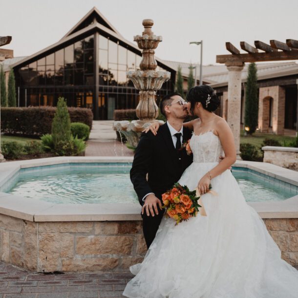 Bride and groom wedding portraits outside St. Laurence Catholic Church in Houston photographed by Bushel + Peck Photo